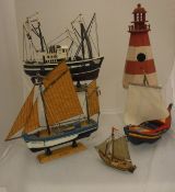 A collection of thirteen various painted wooden sailing/steam boat models and a painted wooden