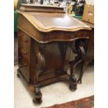 A Victorian burr walnut Davenport desk