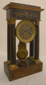 A 19th Century French mahogany and marquetry inlaid cased mantel clock of architectural form,