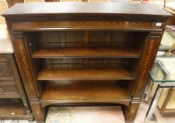 An Edwardian mahoghany and inlaid adjustable bookcase,