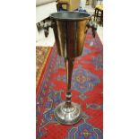 A cast metal floor-standing champagne bucket CONDITION REPORTS There is some