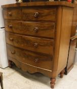 A Victorian mahogany North Country bow fronted chest of two short over three long drawers with