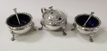 A pair of Georgian silver cauldron salts, together with a later lidded mustard,