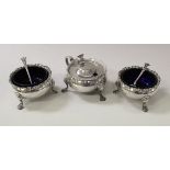 A pair of Georgian silver cauldron salts, together with a later lidded mustard,