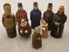 A collection of eight various figural character jugs/bottles etc including three night watchmen in