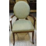 A composite set of twenty five olive green upholstered spoon back chairs in the Georgian style