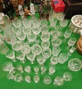 A collection of various cut glassware to include eight hock glasses, two decanters,