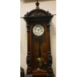 A circa 1900 walnut and ebonised cased Vienna regulator,