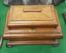 A Victorian mahogany three section tea caddy of bombé sarcophagus form and a pair of cased gold
