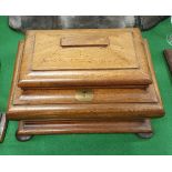 A Victorian mahogany three section tea caddy of bombé sarcophagus form and a pair of cased gold