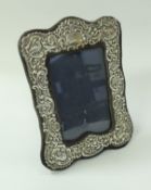 A modern silver photograph frame in the Victorian taste (London 1990)