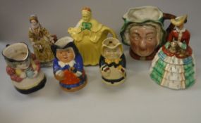 A collection of seven various 19th Century and later female character jugs/figures including woman