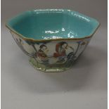 A late 19th Century Chinese polychrome decorated hexagonal bowl decorated with figures in a garden