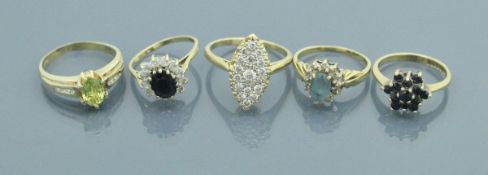 Five various 9 carat gold stone set rings, total weight 16.