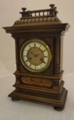 A 19th Century walnut and marquetry inlaid cased mantel clock,