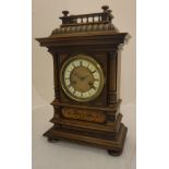 A 19th Century walnut and marquetry inlaid cased mantel clock,