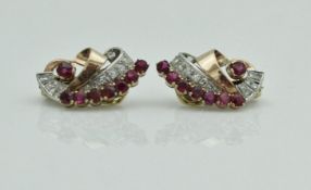 A pair of Art Deco style 18 carat gold ruby and diamond set clip on earrings, total weight 8.