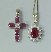 A 9 carat gold mounted ruby and diamond cluster pendant,