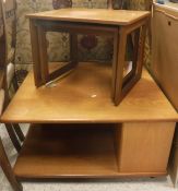 A modern teak G Plan coffee table together with a McIntosh Furniture teak nest of two occasional