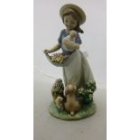 A Lladro figure "A Romp in the Garden" (6907) CONDITION REPORTS Some light surface