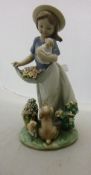 A Lladro figure "A Romp in the Garden" (6907) CONDITION REPORTS Some light surface