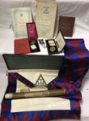 A collection of various Masonic regalia including sash,