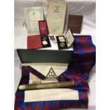 A collection of various Masonic regalia including sash,