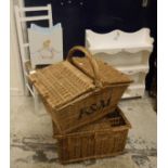 A Dragon Furniture shelf unit decorated with Peter Rabbit, etc, a similar waste bin,