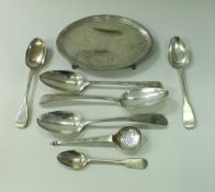 A late Georgian silver oval teapot stand, together with various Georgian and later tablespoons,