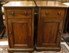 A pair of mahogany pot cupboads in the Victorian manner,