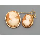 A 9 carat gold mounted cameo brooch and another smaller similar