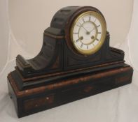 A late Victorian rosso and black marble cased mantel clock,