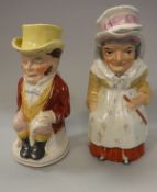 A 19th Century pottery character jug as "Martha Gunn" together with another as "John Bull"