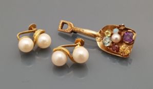 A pair of 14 carat gold mounted double pearl earrings,