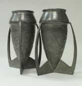 A pair of Archibald Knox for Liberty & Co Tudric pewter "bomb" vases (0226) with stylised floral