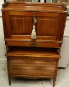 A circa 1900 mahogany student's desk with fall front opening to reveal a fitted interior and