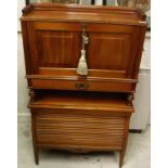 A circa 1900 mahogany student's desk with fall front opening to reveal a fitted interior and