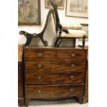 A 19th Century mahogany chest of two short over three long drawers, on splayed bracket feet,