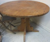 A modern pine circular table, together with a 19th Century painted wood two-tier occasional table,