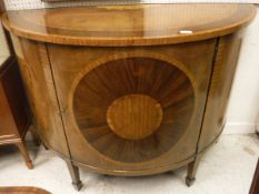 A 19th Century walnut and inlaid demi-lune cabinet in the Sheraton style,