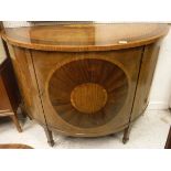 A 19th Century walnut and inlaid demi-lune cabinet in the Sheraton style,