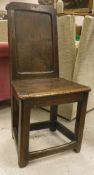 An 18th Century oak back stool of plain form,