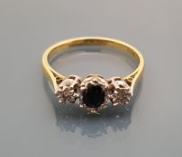 An 18 carat gold sapphire and diamond set ring, ring size Q, total weight 3.