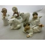 A collection of six various Lladro figures including two polar bears,