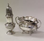 A George V silver twin-handled sugar bowl with pierced decoration,
