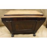 A 19th Century Irish mahogany wine cooler of sarcophagus form,