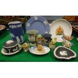 A collection of various 20th Century English chinawares to include Royal Worcester bird figures