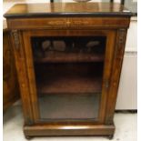 A Victorian walnut and inlaid display cabinet with single glazed door