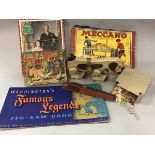 A box of various toys and books to include Waddingtons Famous Legends jigsaw, Schuco Mouse,