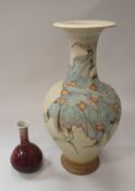 MICHAEL AND BARBARA HAWKINS (Port Isaac Studio Cornwall) - a tall vase with floral glazed